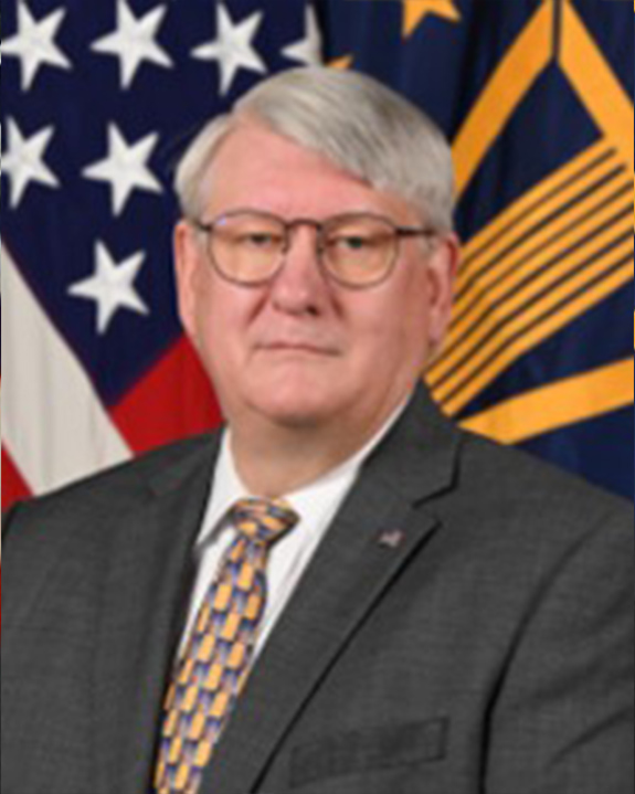 a profile image of director of defense support services center Alex Baird