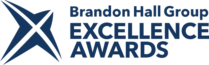 Slanted star logo with the words Brandon Hall Group Excellence Award