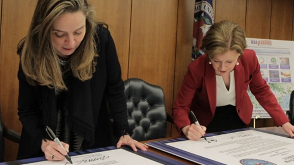In March 2019, Margaret Weichert (left) and Lisa W. Hershman (right) signed an OPM-DoD memorandum of agreement for DoD enterprise digital learning reform